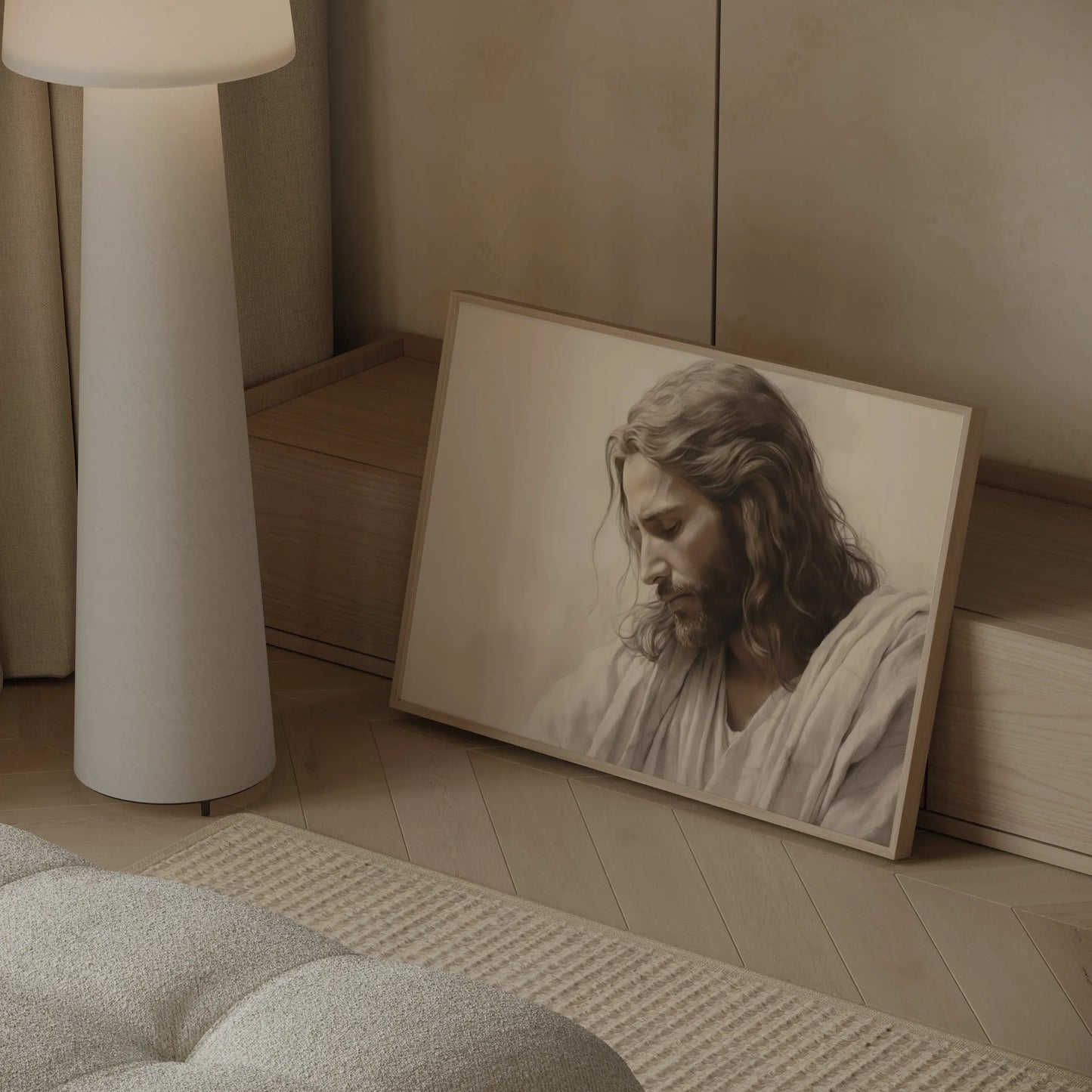 Christian wall art print of Jesus with bowed head displayed in a modern neutral interior