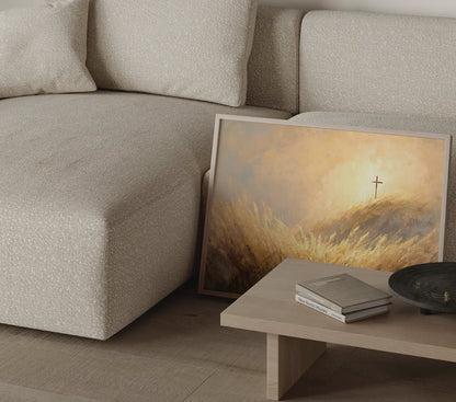 Christian cross wall art print with golden light and wheat field in a thin frame in a modern neutral living room – JesusArtworks