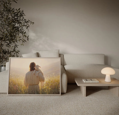 Safe in His Keeping Jesus and lamb Christian art print in a neutral Scandinavian home with white walls, warm wood, and soft lighting