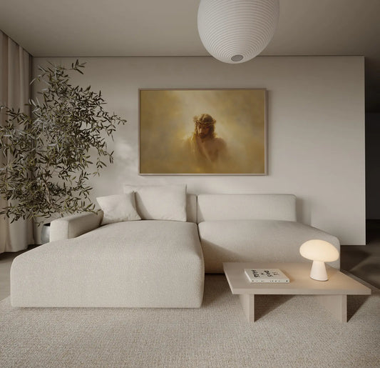 Painting of Jesus wearing crown of thorns with serene face and warm ethereal glow in modern christian home