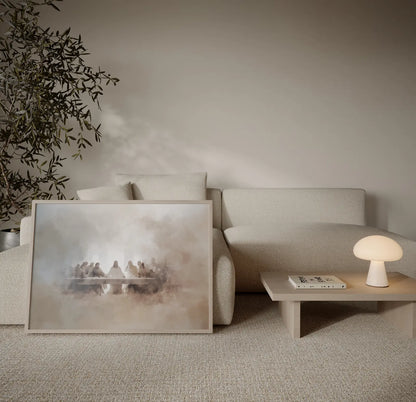 Last Supper Jesus and disciples misty watercolor beige art print in a natural wood float frame leaning against a linen sofa in a calm neutral living room – JesusArtworks