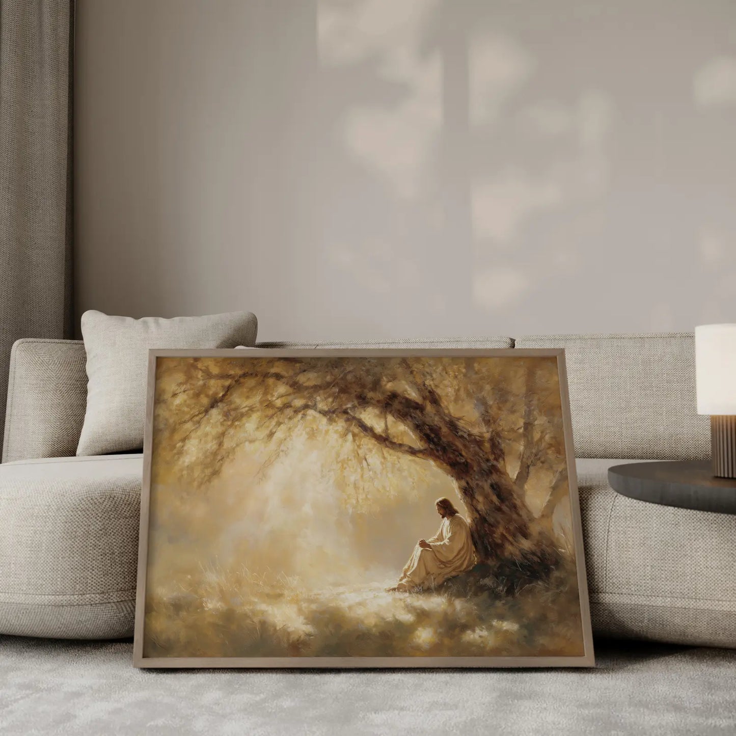 Jesus praying under a golden tree wall art print displayed in modern living room – The Quiet Prayer by JesusArtworks