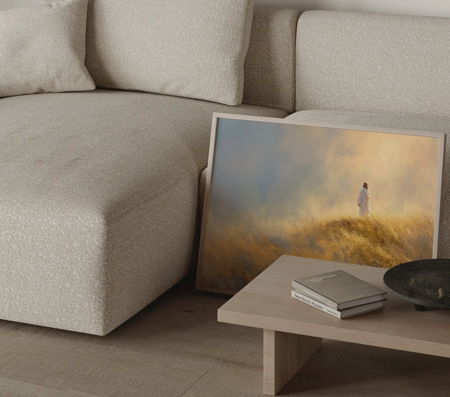 Jesus walking alone wall art print with warm golden and blue tones in a thin frame in a modern neutral living room – JesusArtworks