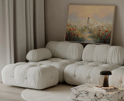 He Goes Before You framed Jesus wildflower meadow oil painting print in a bright Scandinavian living room with white walls and natural wood frame – JesusArtworks