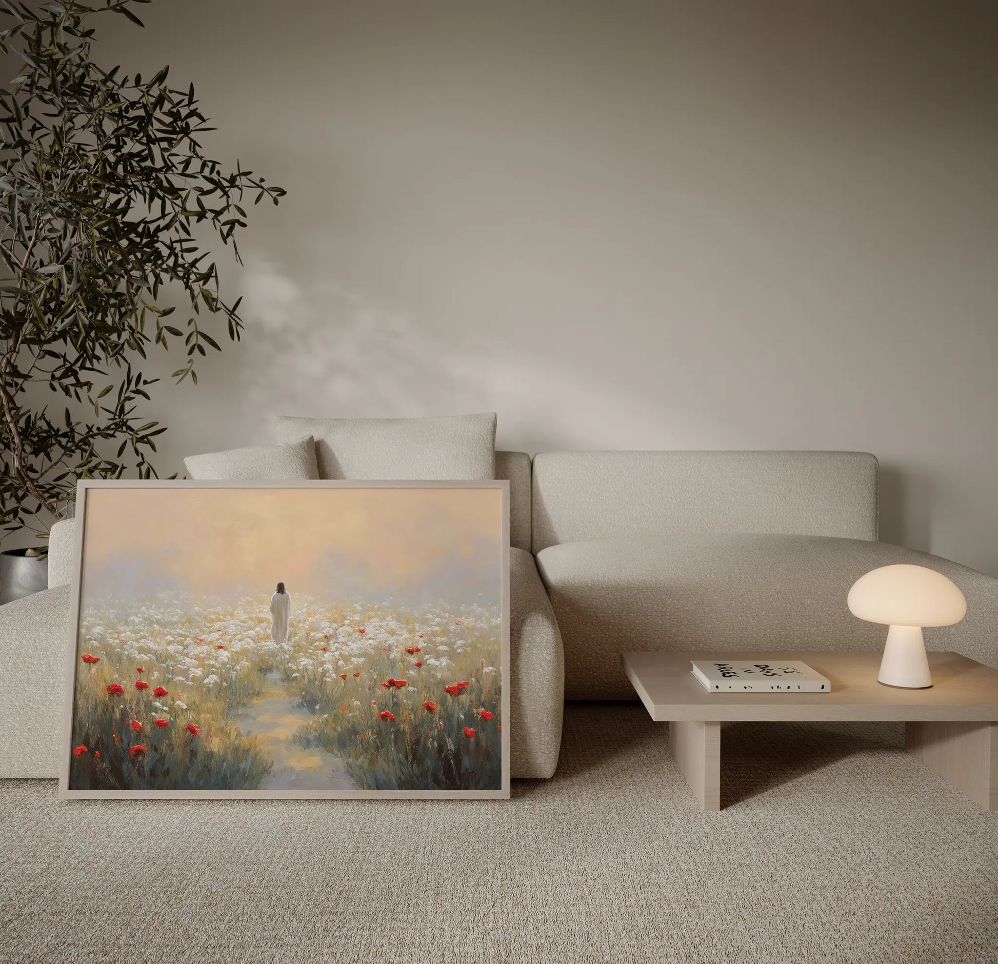Jesus walking through white wildflowers at sunset with mountain backdrop art print displayed infront a sofa in a warm neutral living room – JesusArtworks