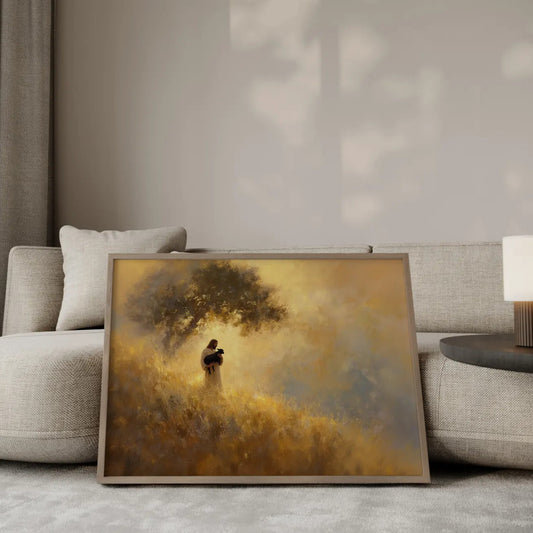 The Found One Jesus holding a black lamb wall art print in a gold frame leaning against a modern beige sofa – Christian home decor by JesusArtworks